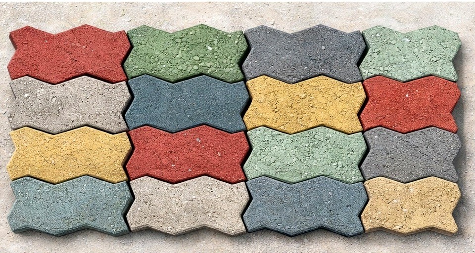 Interlocking coloured paving stones laid out for display